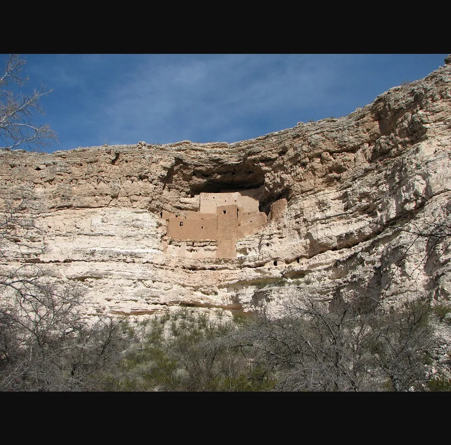 Montezuma Castle cliff dwelling nestled in limestone cliff face